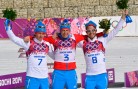 Russian skiers celebrate a sweep in the 50km. (GEPA/Ross Burton)