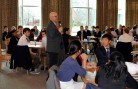 Jory Macomber addresses students and faculty at the Holderness School. Holderness
