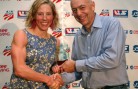 Dexter Paine presents Kikkan Randall with the 2011 USSA Cross-Country Skier of the Year Award. Sarah Ely/USSA