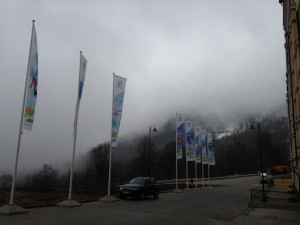 Fog clung to the mountains above Sochi on Monday, causing postponements  and cancellations. (Geoff Mintz)