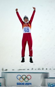 The kid's got ups: Kamil Stoch celebrates Poland's first gold medal since '72.