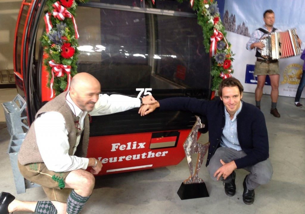 Felix Neureuther poses with his gondola car and replacement trophy. hahnenkamm.com