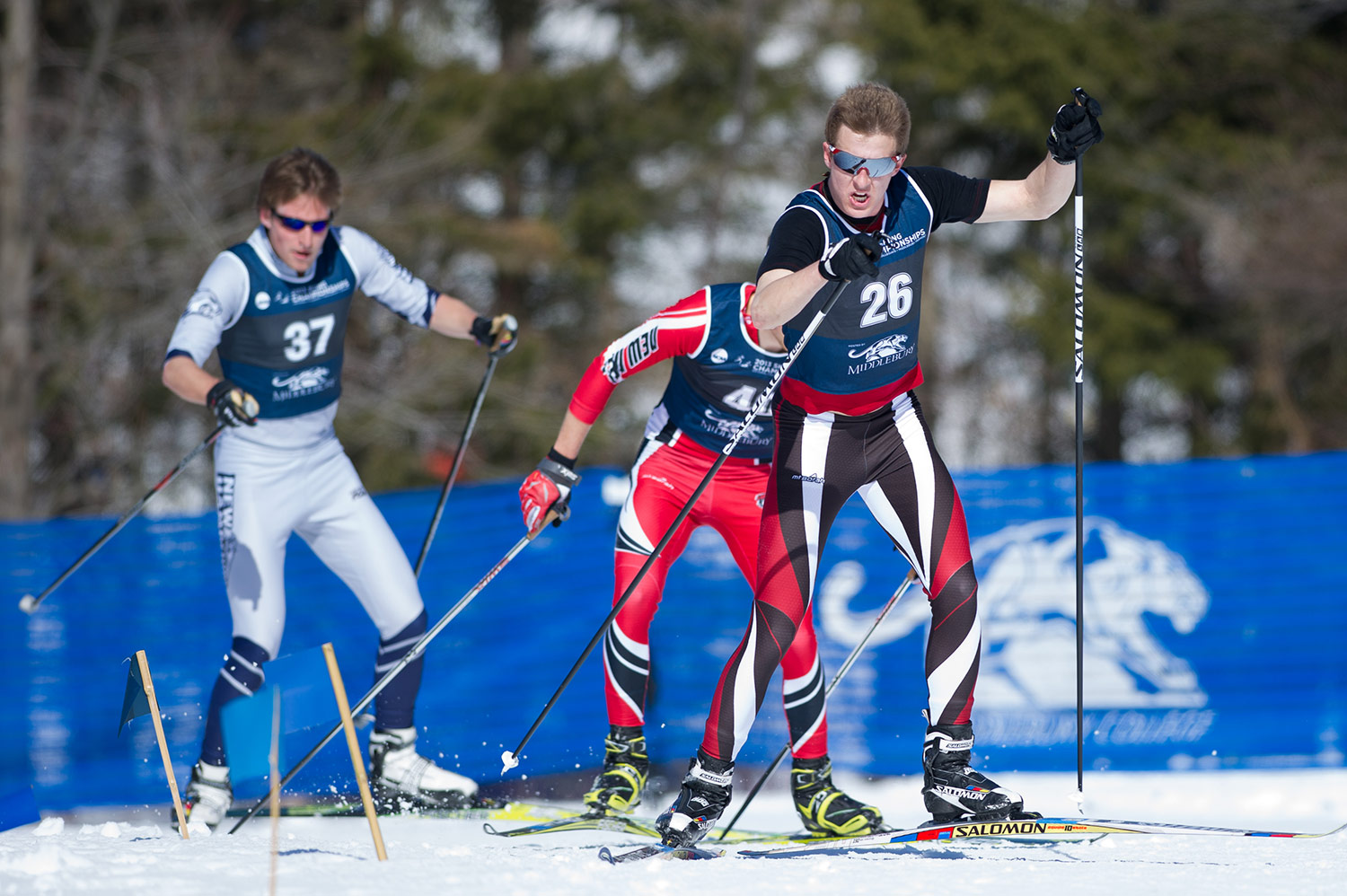 St. Lawrence, New Mexico, and UNH skiers gather together at the 2013 NCAA Championships. Credit: flyingpointroad.com
